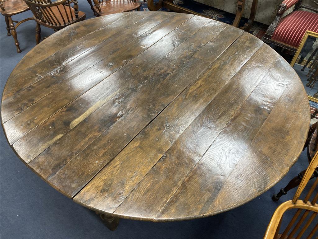 An 18th century and later oak bobbin leg gateleg dining table, length 170cm extended, width 162cm, height 76cm